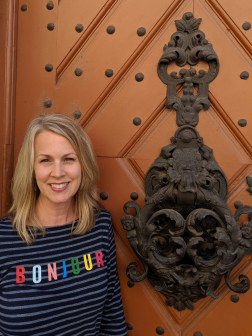 Paige Riehl in a doorway in Budapest